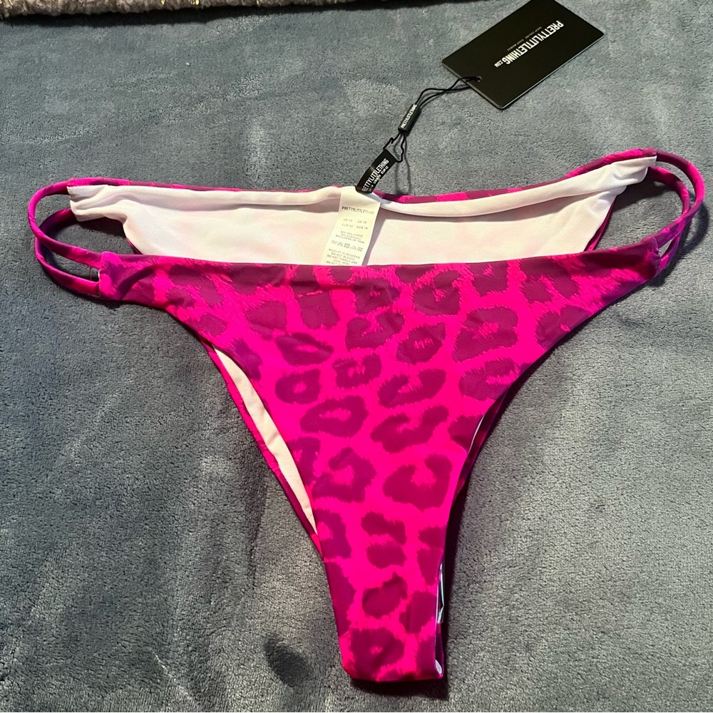 Brand new Vibrant pink bathing suit bottom can be paired with a bikini top.